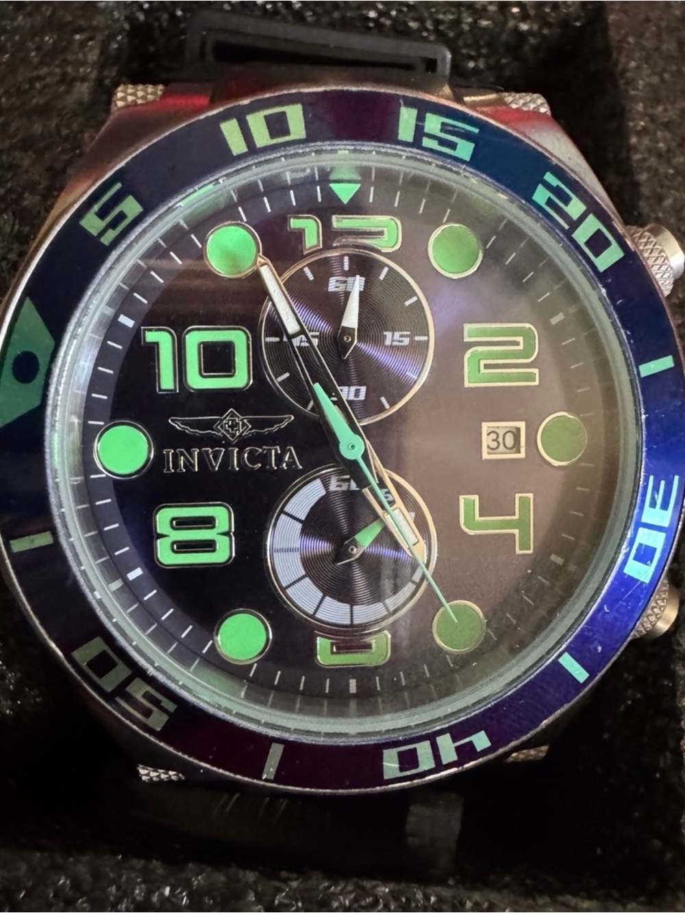 Invicta Black Watch with Green Lume Accents
